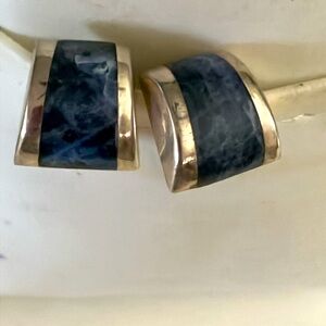 Squarish sodalite gems in curved sterling silver bezel post earrings setting